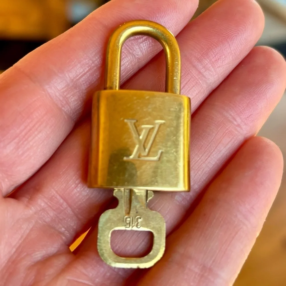 LOUIS VUITTON Authentic Gold Padlock with Key